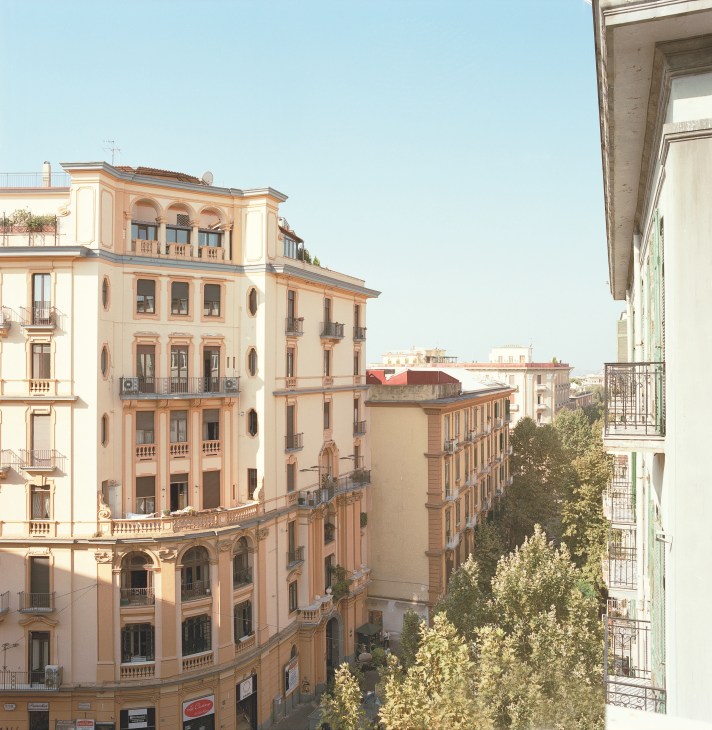 Elegant Liberty-style palazzo buildings line Via Domenico Cimarosa in Naples' Vomero district.