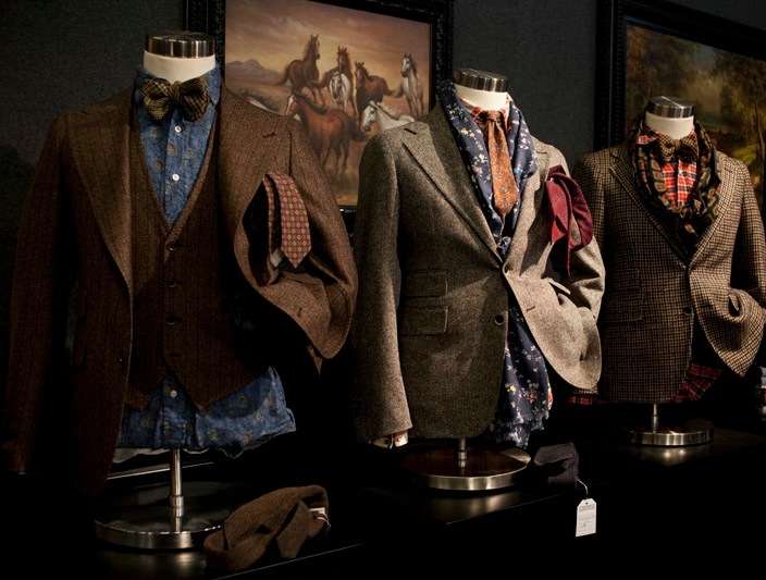 Salvatore Piccolo suit jackets displayed on mannequins with various patterns and textures.
