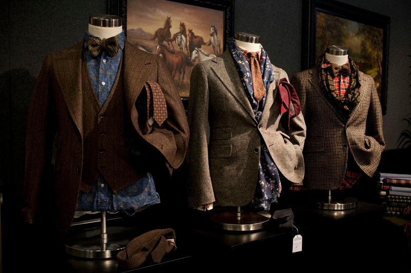 Salvatore Piccolo suit jackets displayed on mannequins with various patterns and textures.