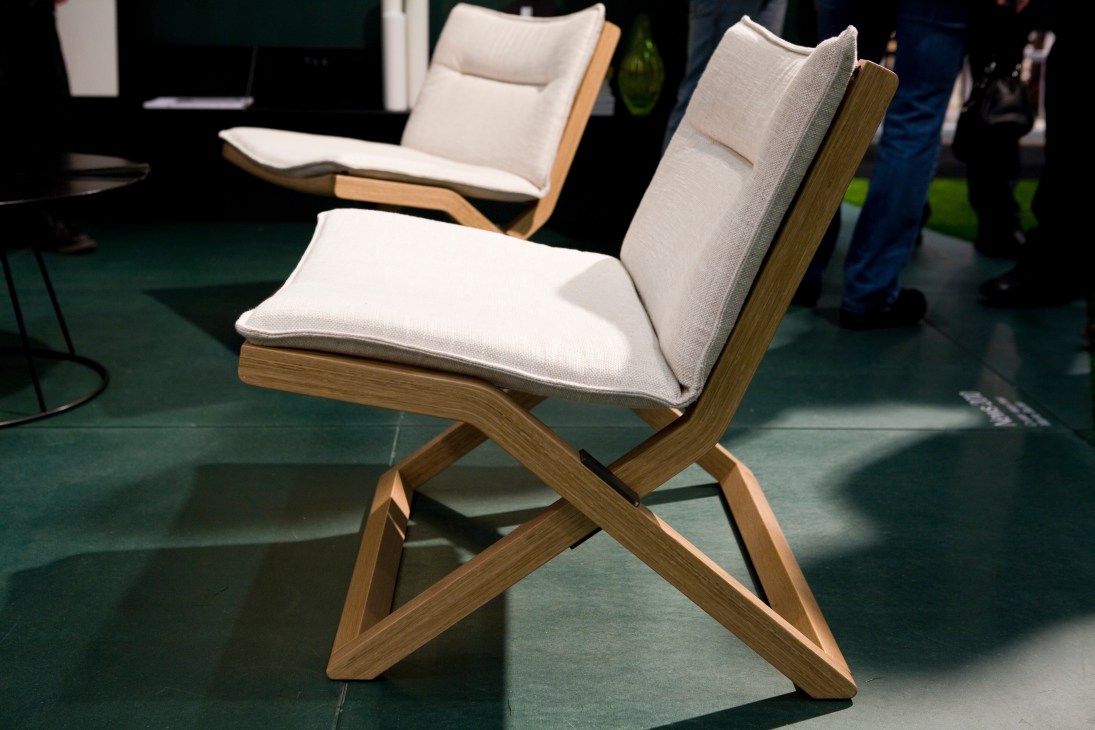 Cruiser chair by Marina Bautier for Swedese with wooden X-frame and cream upholstered seat.