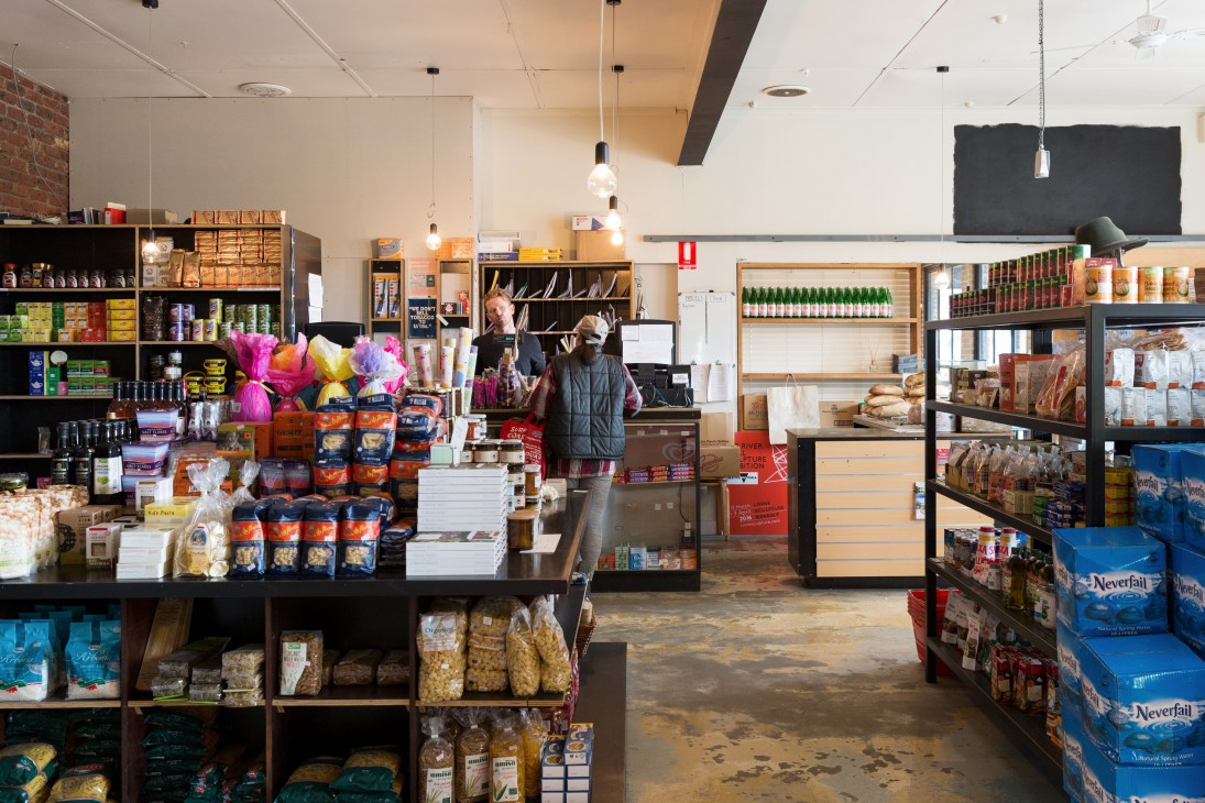 Shop manager Shaun McKinlay serving a customer inside Wye River General Store