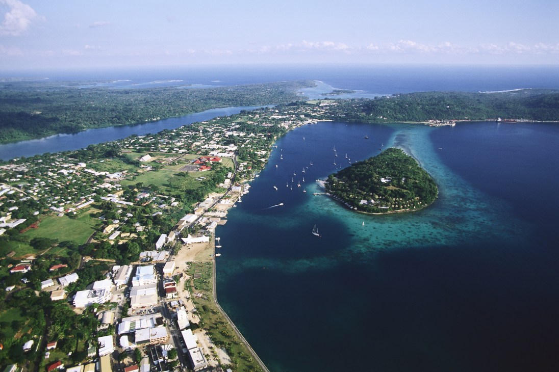 Aerial view of Port Vila, Vanuatu showing the coastal capital with surrounding islands and turquoise waters.