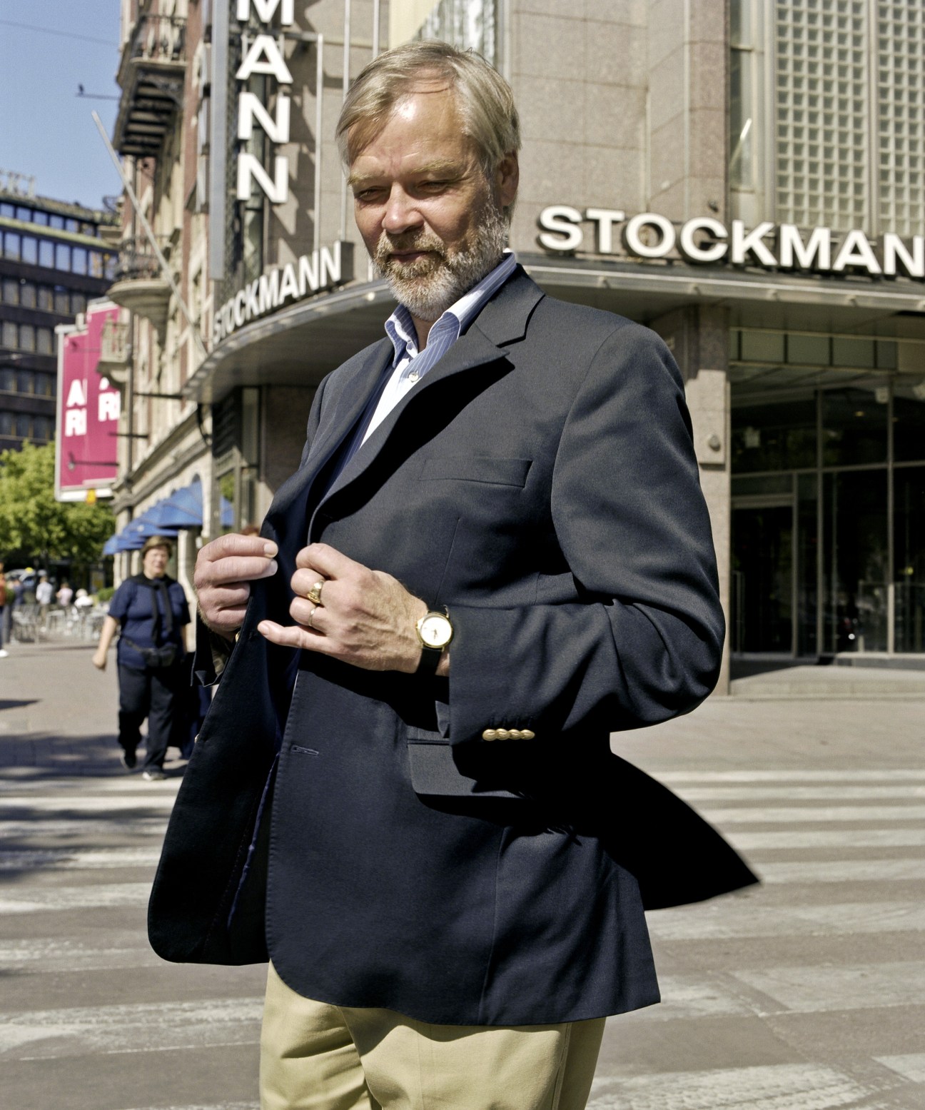 Hannu Penttilä stands outside the Stockmann department store in Helsinki.