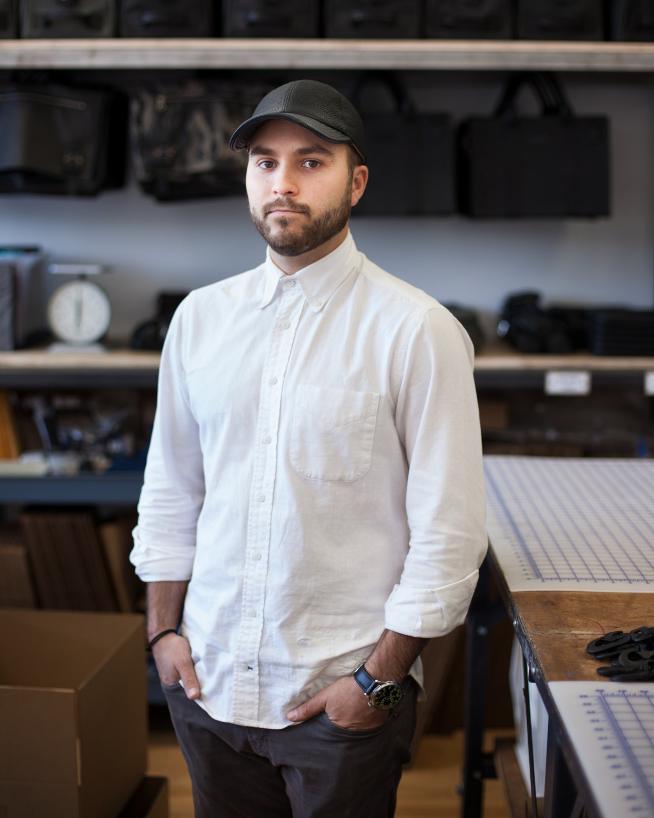 Spencer Nikosey, founder of KillSpencer leather brand, poses in his Downtown Los Angeles workshop.