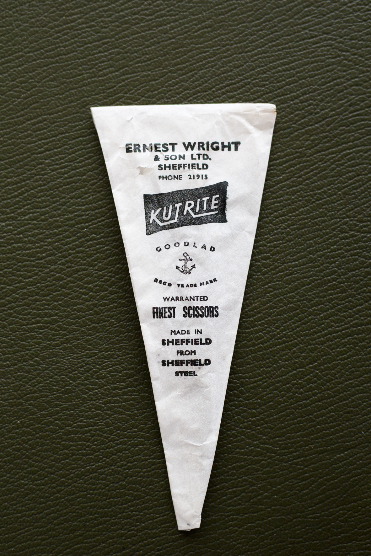 Vintage Ernest Wright & Son scissor packaging sleeve with Kutrite Goodlad branding on green background.