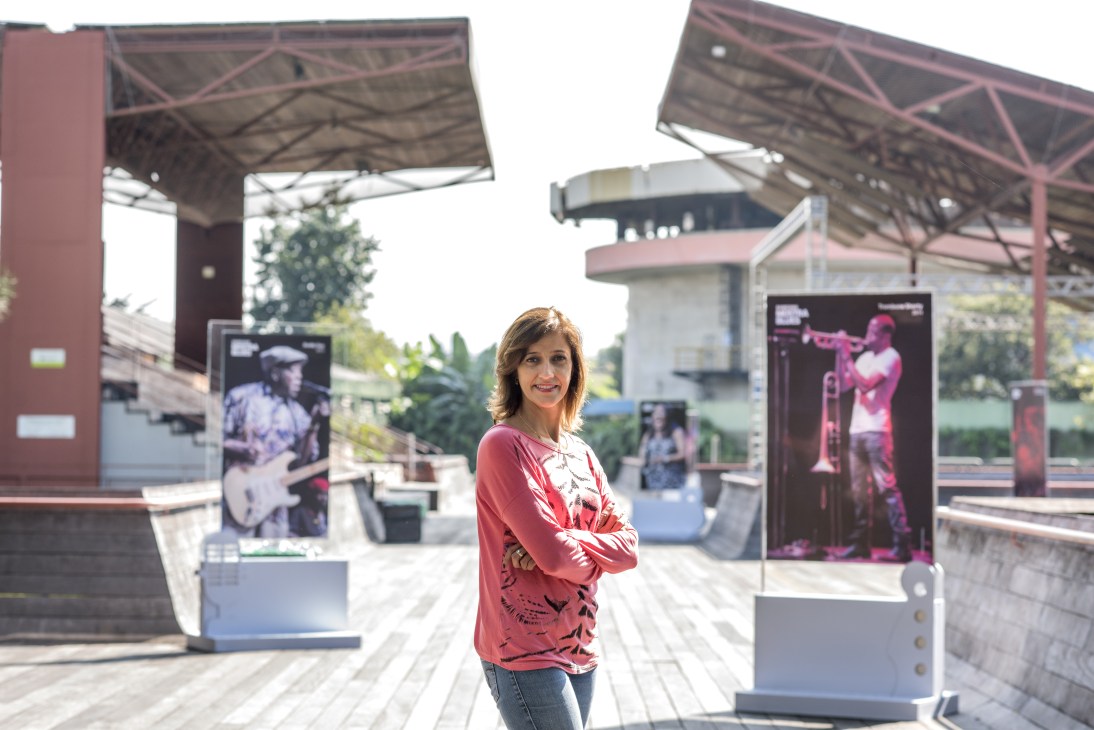 Elisabeth Barboza, activities co-ordinator for Victor Civita square, stands in the plaza with arms crossed.