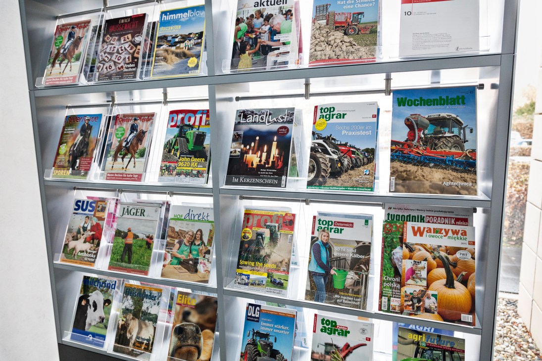 Magazine display shelf showing multiple agricultural publications and titles