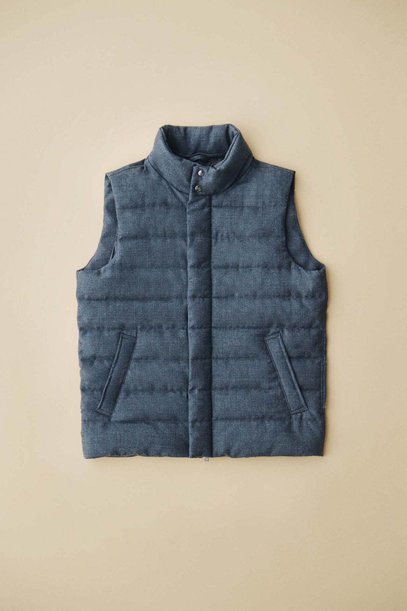 Navy quilted down vest by Herno with stand collar and front button closure