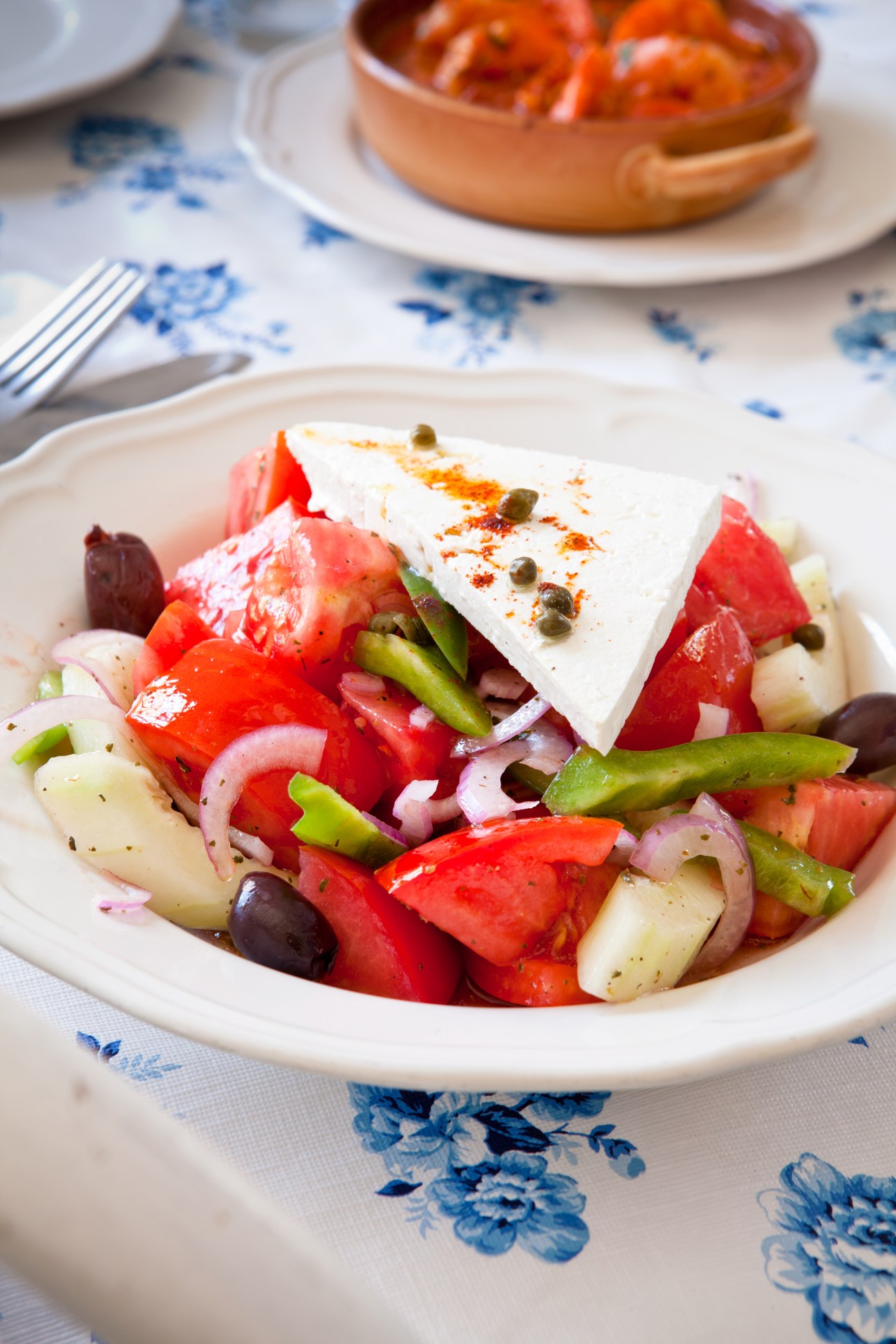 Greek salad with feta cheese, tomatoes, olives, green beans and red onions at Mandolin Aegean Bistro in Miami.