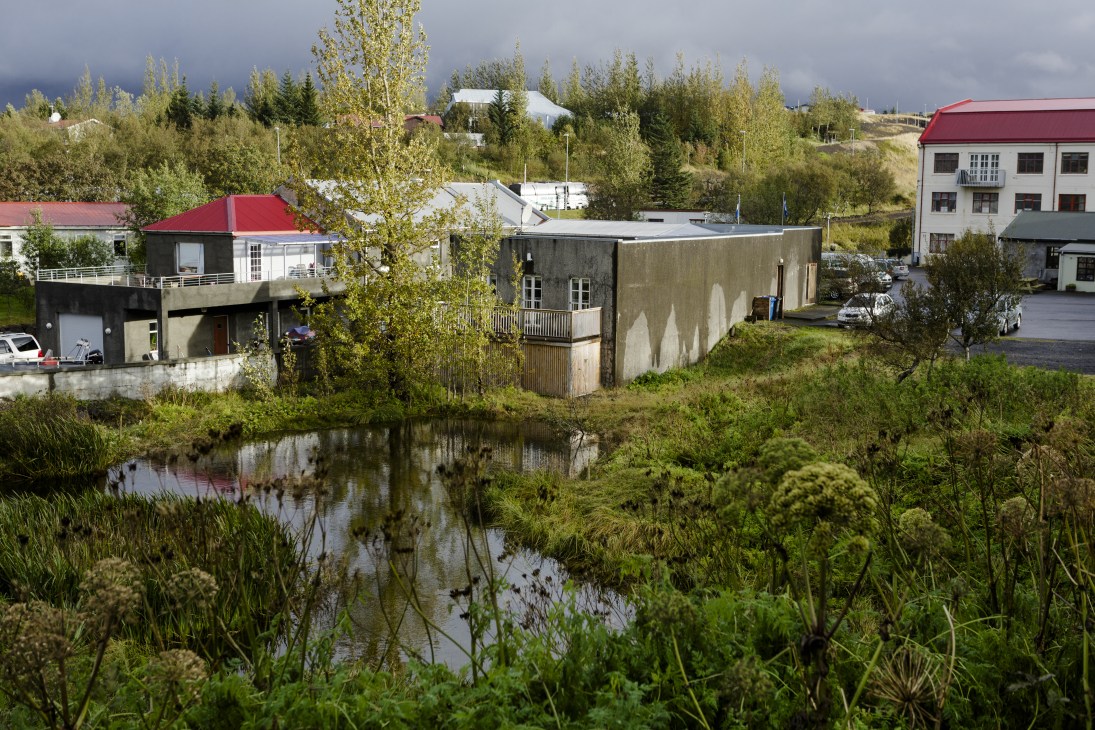Sundlaugin recording studio exterior by a geothermal stream in Mosfellsbær, Iceland.