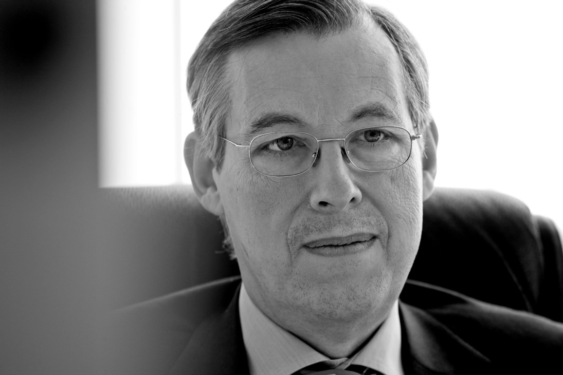Black and white portrait photograph of François Heisbourg wearing glasses and a dark suit.
