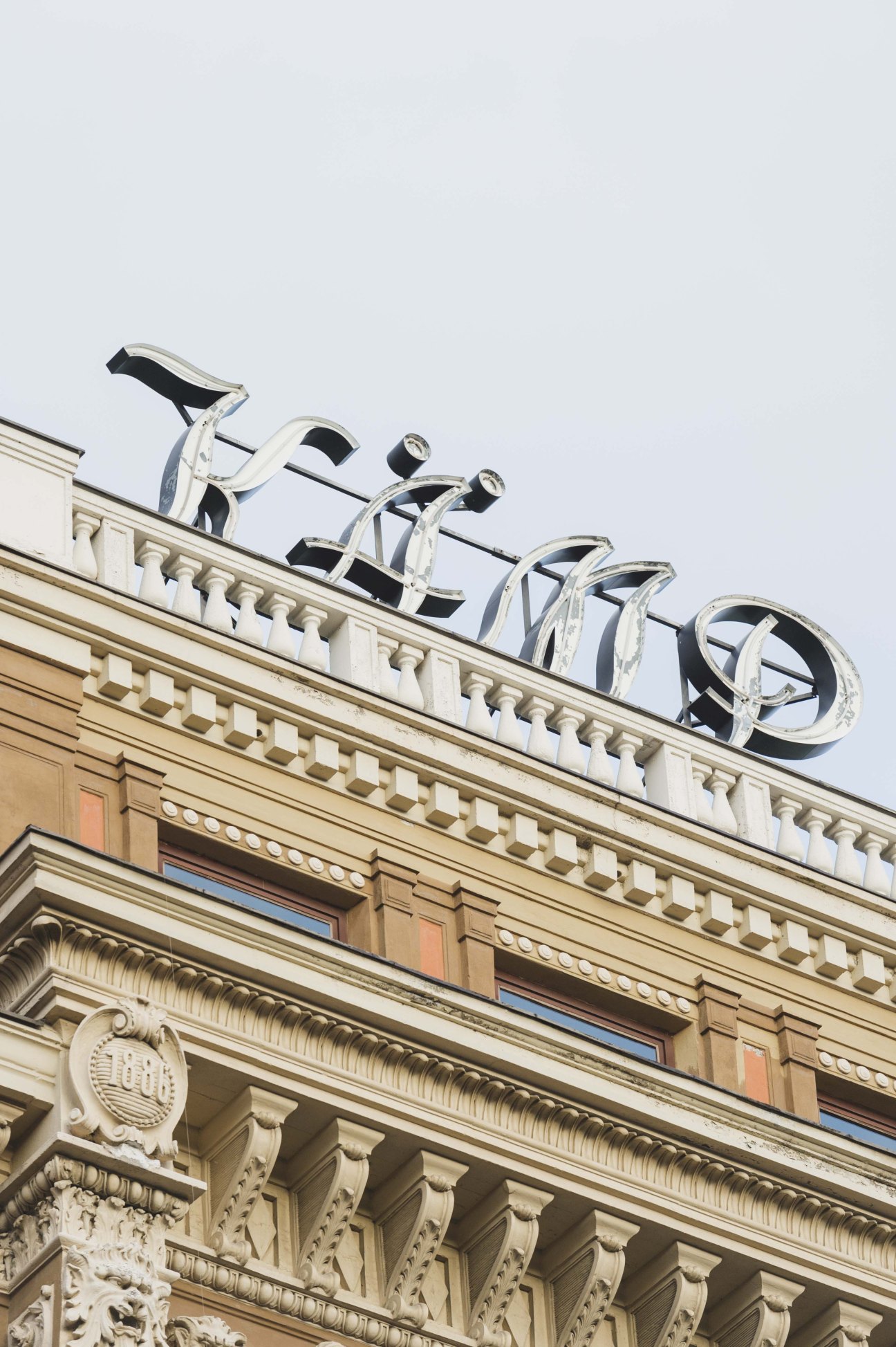 Hotel Kämp neon sign on classical building facade in Helsinki