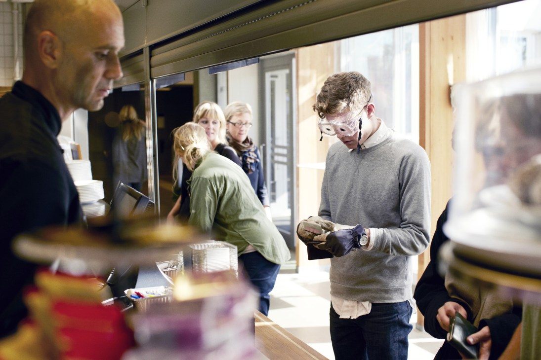 Student wearing safety goggles simulating vision problems during design workshop at Lund University.