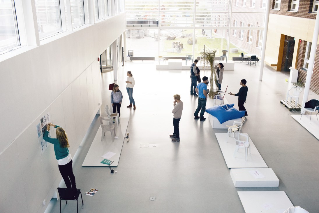 Students display design projects in a bright, spacious gallery space at Lund University.