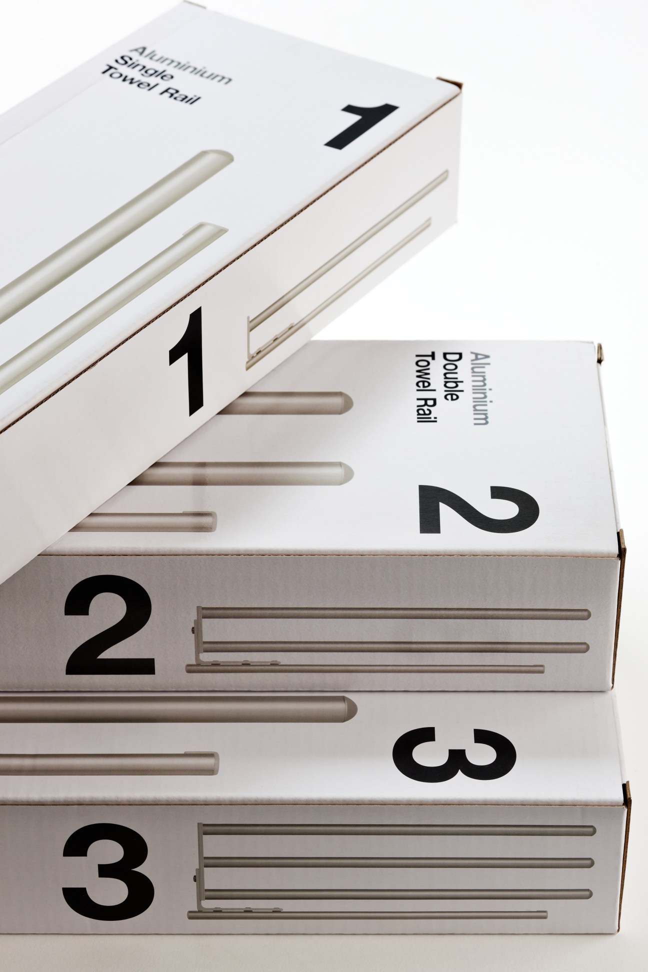 Stacked packaging boxes for Häfele aluminum towel rail with minimalist design, numbered 1-3 with black typography and product details.