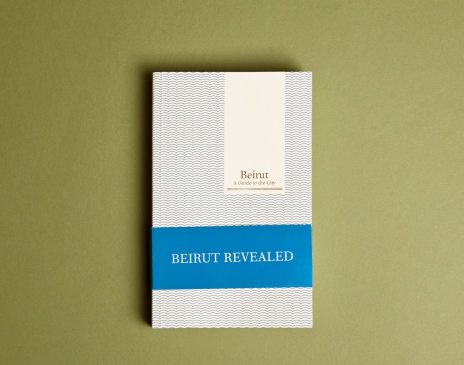 Book cover of Beirut Revealed by Carole Corm featuring a wavy pattern design with blue band and white center panel.
