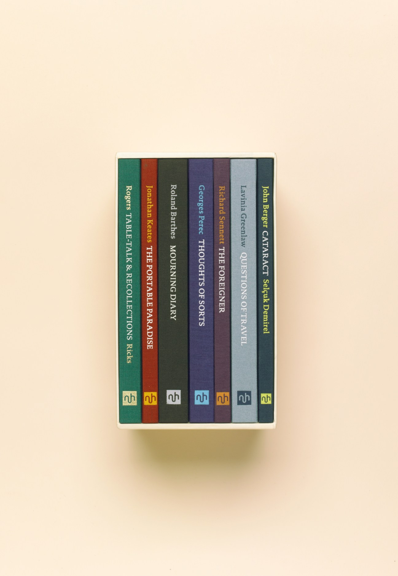 Notting Hill Editions boxset containing seven classic literary essays with colorful cloth spines.