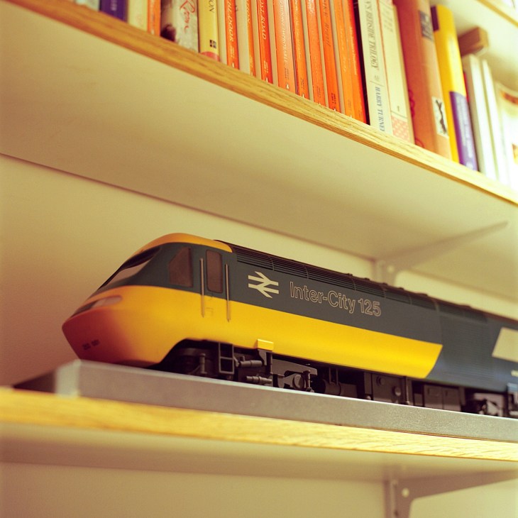 Model of Kenneth Grange's HST 125 InterCity train for British Rail displayed on a shelf.