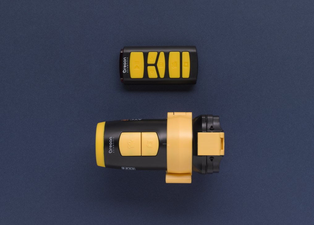 ATC9K HD camera from Oregon Scientific with yellow and black design, shown with mounting bracket and accessories.