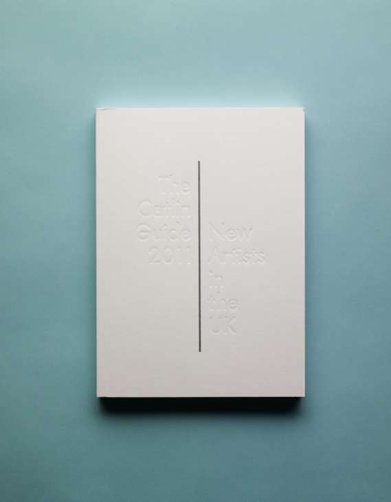 The Catlin Guide pocketbook with white embossed cover and vertical grey line on turquoise background.