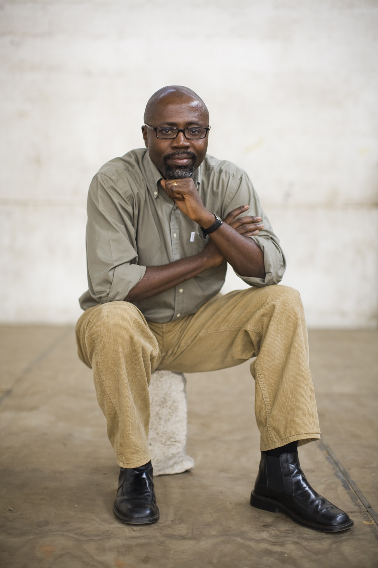 Godfrey Mwampebwa (aka Gado), a Kenyan cartoonist and puppet show creator, poses for a portrait.