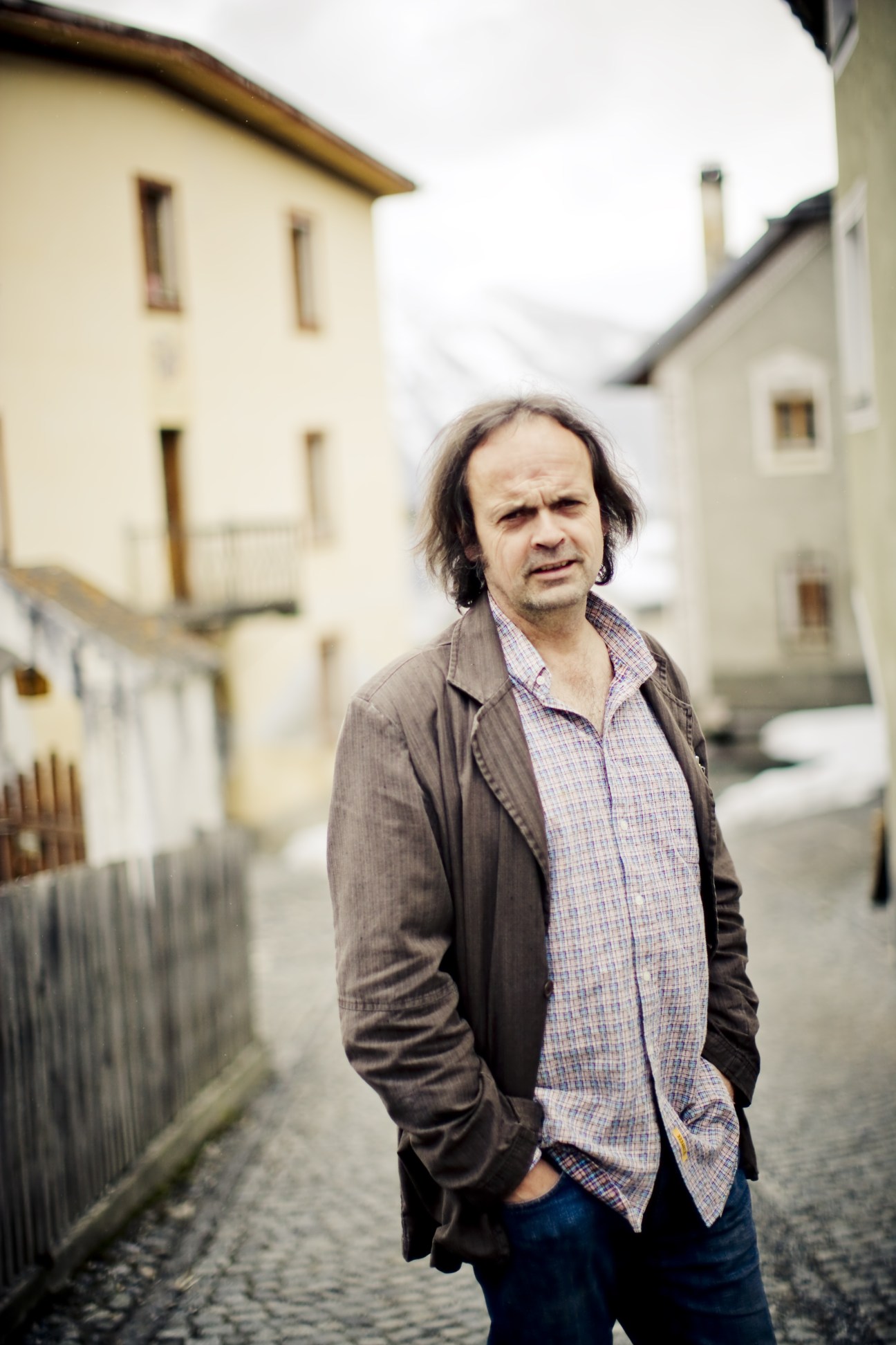 Angelo Andina, founder of Bieraria Tschlin, standing in the Alpine village of Tschlin.