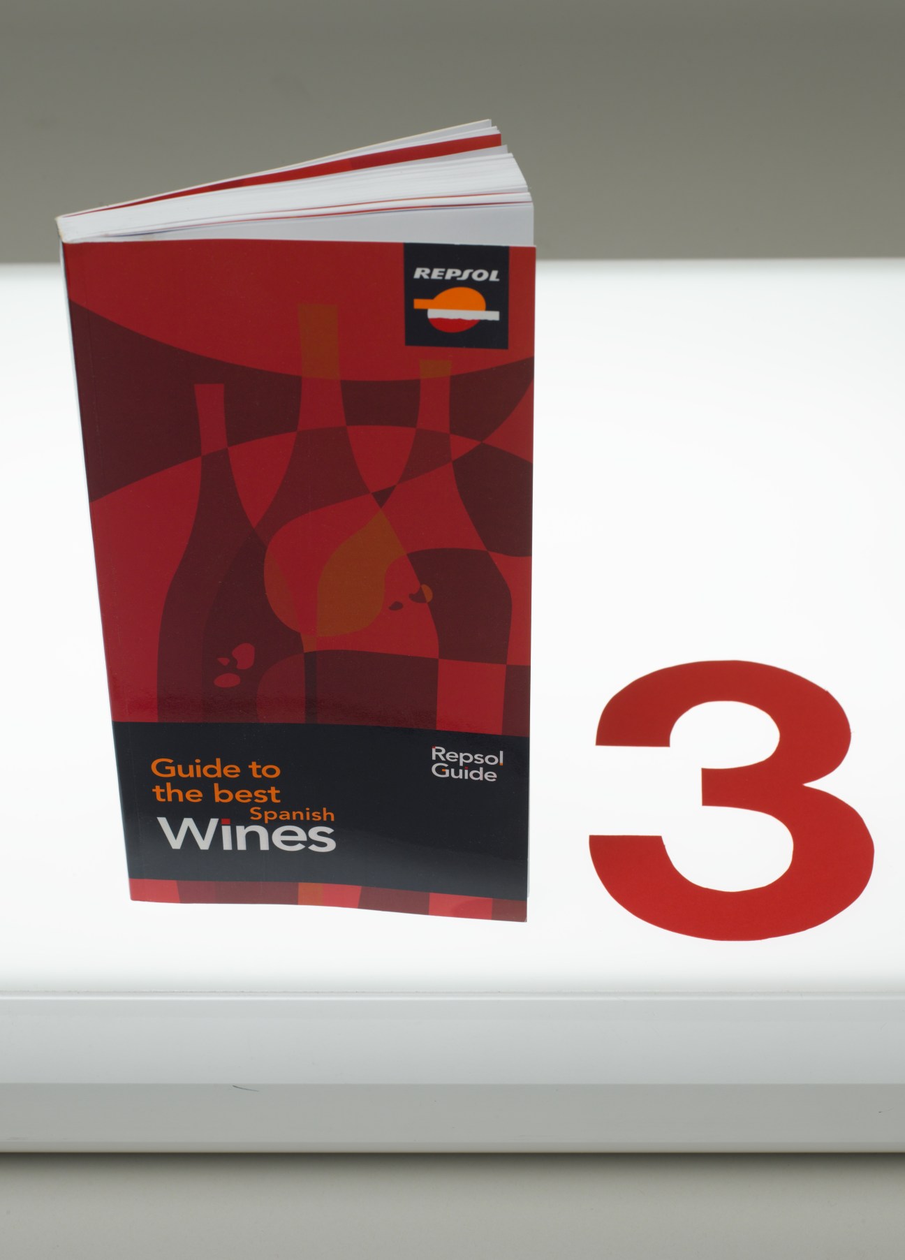 Repsol Guide to the best Spanish Wines book with red geometric cover design and large number 3.