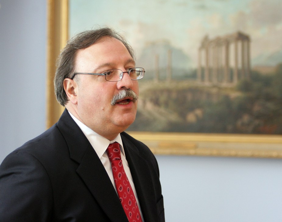 Grigol Vashadze, Georgia's Foreign Minister, in profile wearing glasses and a red tie.