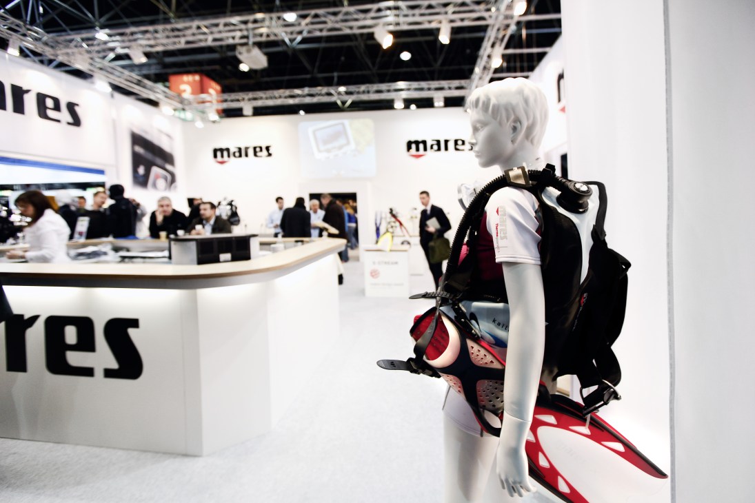 Mares diving equipment display with mannequin wearing white shirt and black diving gear at Boot 2011 exhibition.