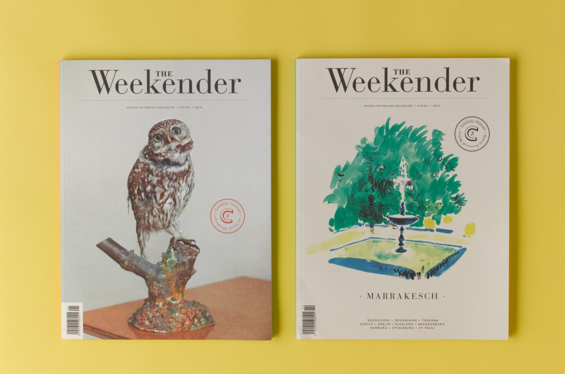 Two issues of The Weekender magazine displayed on yellow background, featuring owl and garden fountain cover designs.