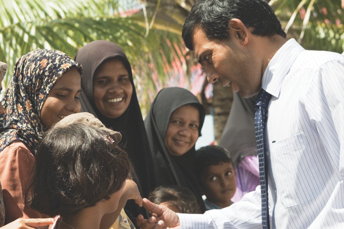 President Mohamed Nasheed meets and greets islanders during a visit to the Maldives.