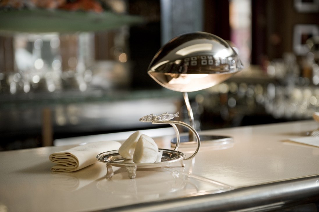 Decorative butter dish with fish-shaped handle and dome cover at J Sheekey restaurant.
