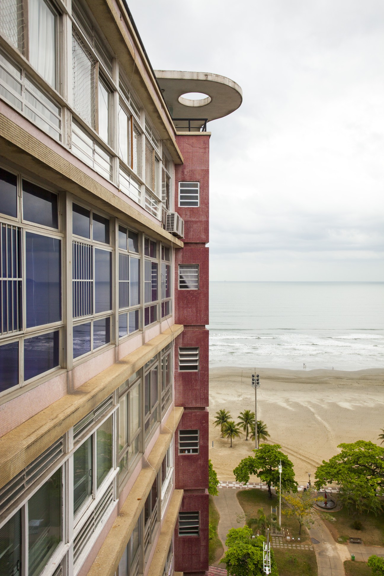 Facade of Parque Verde Mar building overlooking Boqueirão beach in Santos, Brazil.