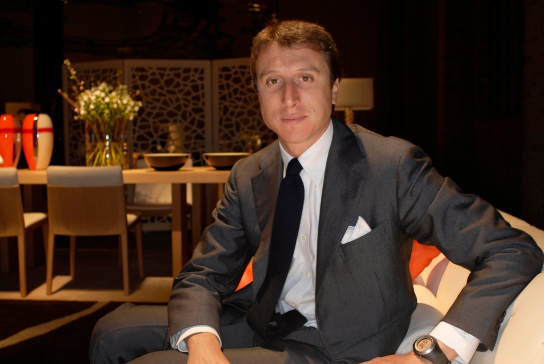 Matteo di Montezemolo, vice-president of Poltrona Frau Group, sitting in a modern furniture showroom display.