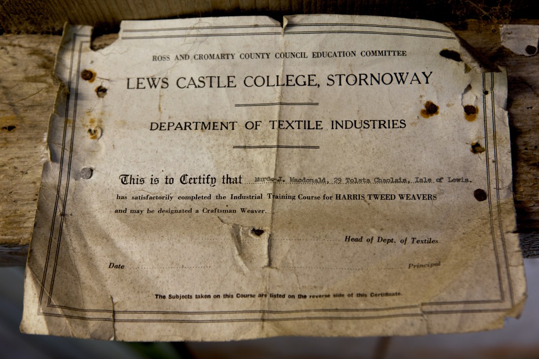A faded 1967 Harris Tweed weaver's certificate from Lews Castle College certifying Murdo Macdonald as a craftsman weaver.