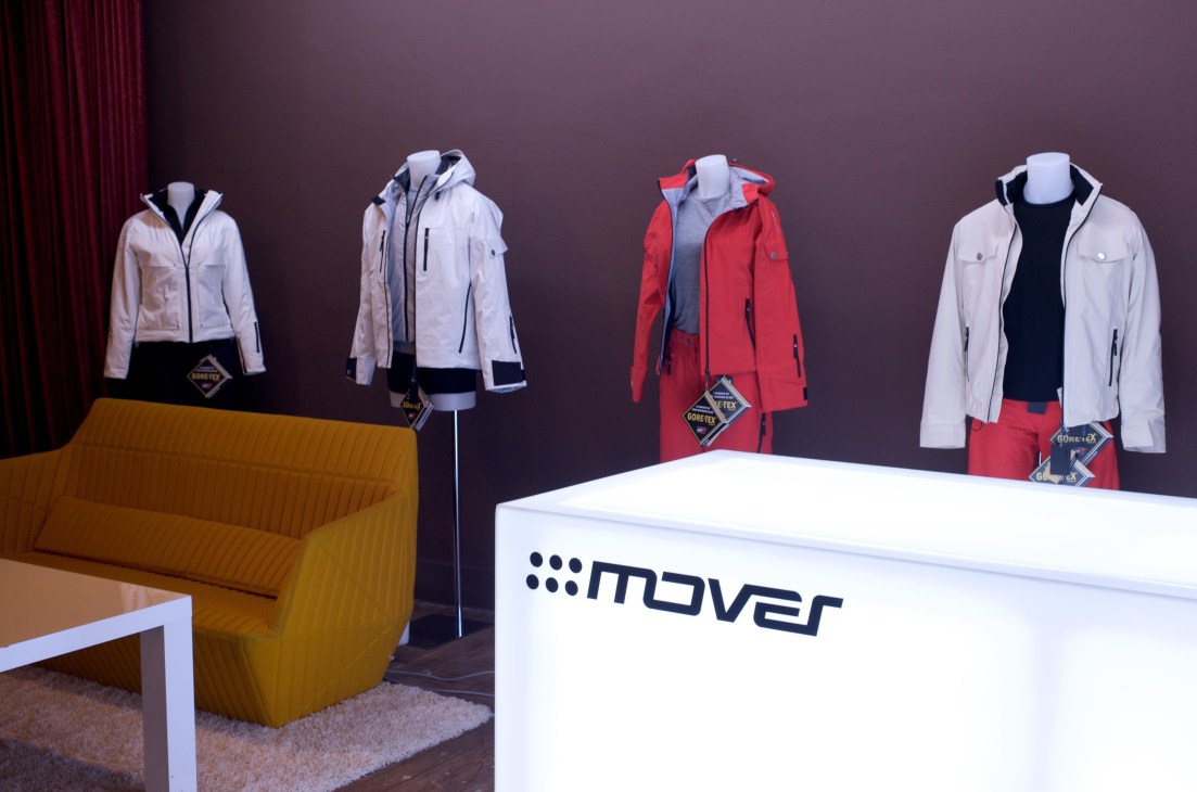Mover ski jackets displayed on mannequins in the Geneva boutique shop with white counter.