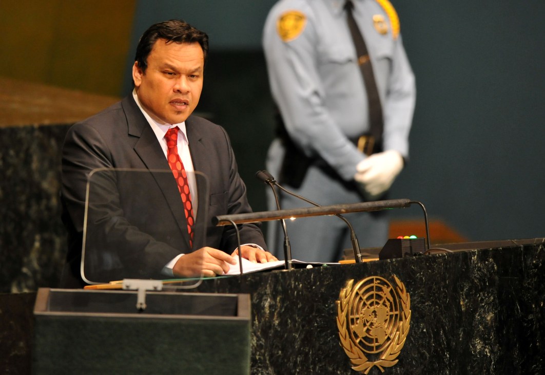 Sprent Dabwido, Nauru's president, speaking at a United Nations podium wearing a dark suit and red tie.