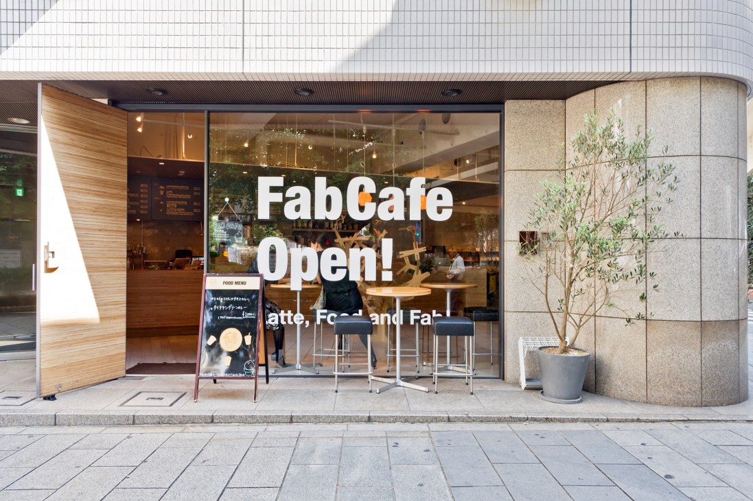 FabCafe storefront in Tokyo with glass facade and 'Open' signage visible