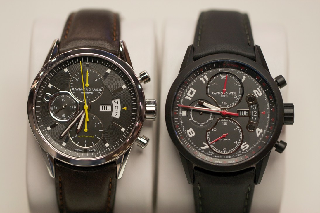 Two Raymond Weil Freelancer Date Chronograph watches with dark dials and leather straps displayed side by side.