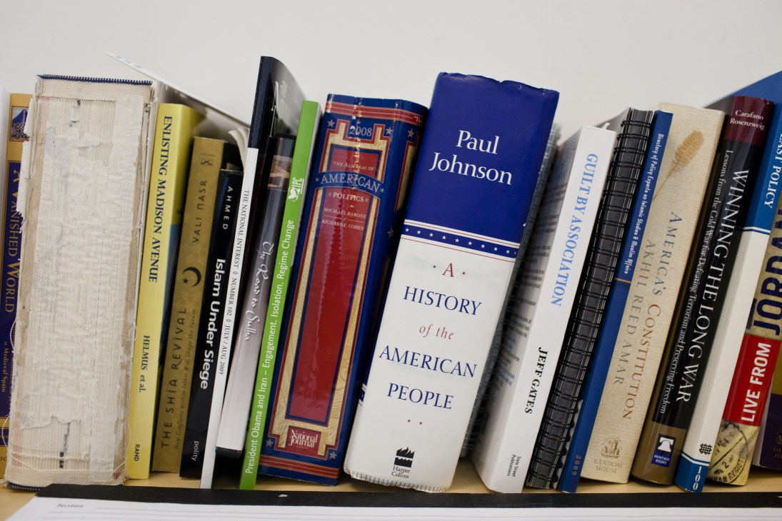 Bookshelf displaying various books on US politics including titles on American history and politics.