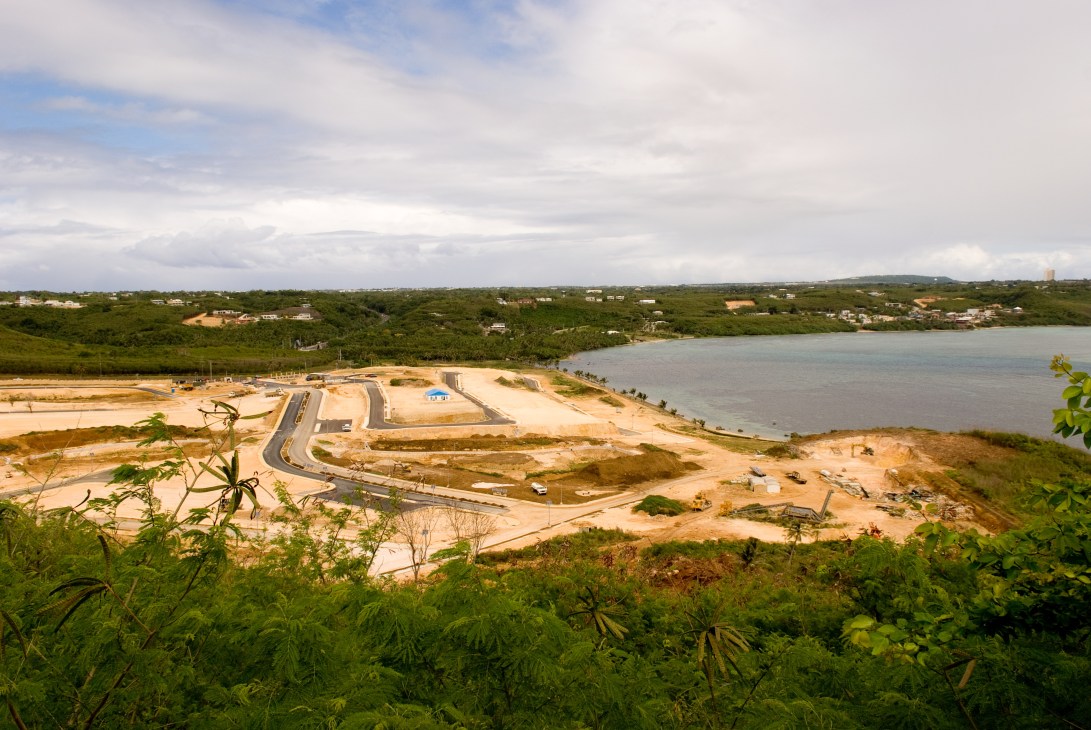Aerial view of The Laguna development with tiered land plots overlooking Pago Bay on Guam's east coast.