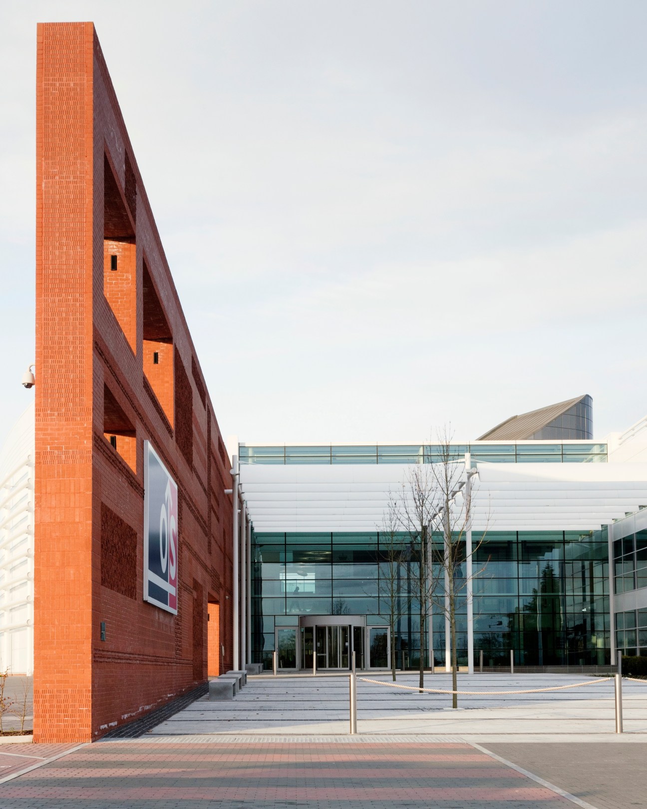 The Ordnance Survey headquarters in Southampton with distinctive red-brick architecture and modern glass building.