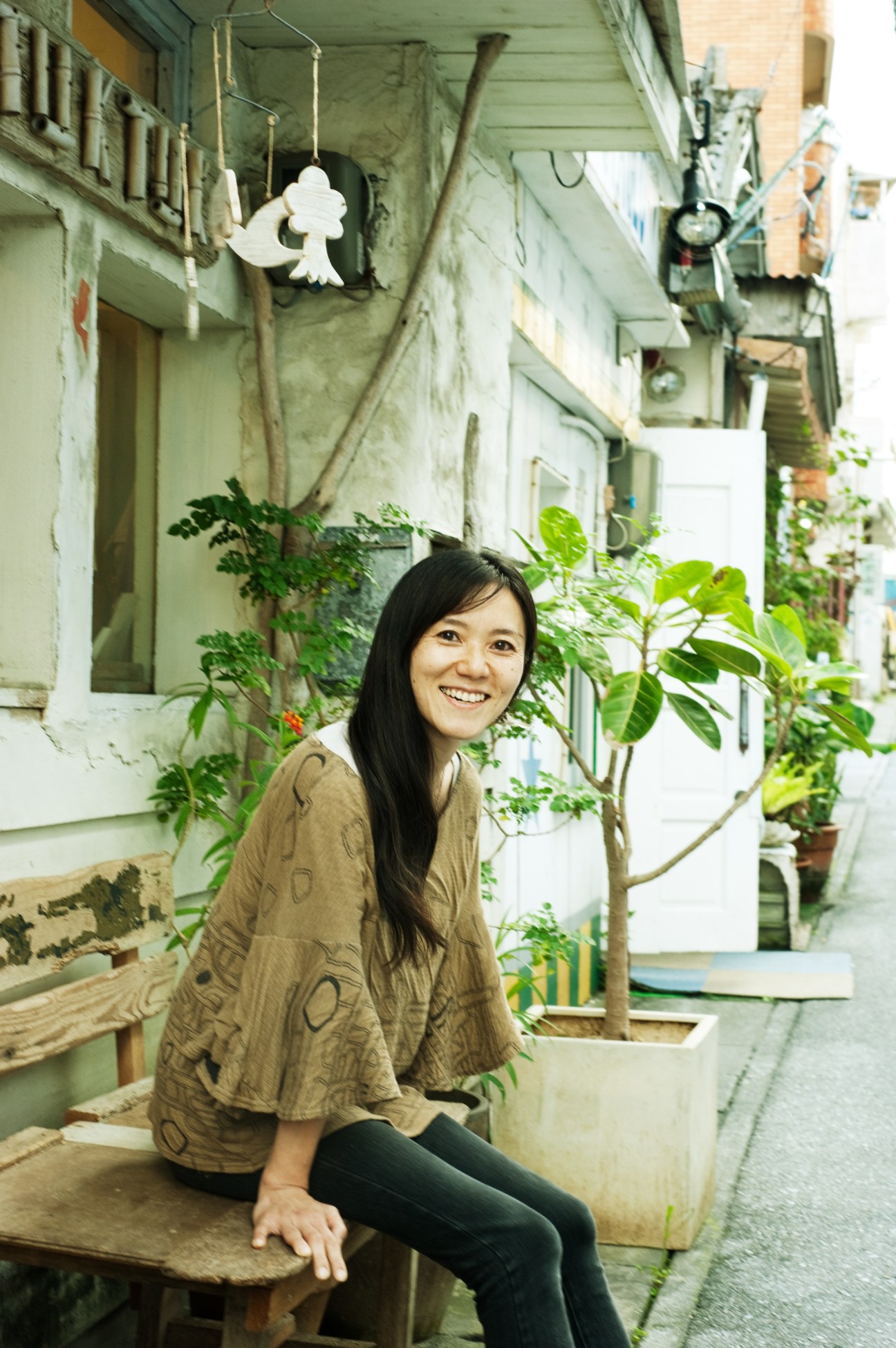 Dyeing and weaving artisan Keiko Chikaoka smiles at her atelier Tuitree + Zakka Tuktuk in Naha.