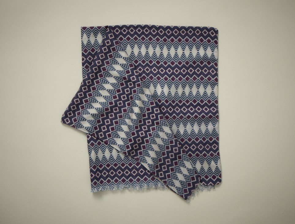 Geometric patterned scarf in navy, burgundy and cream with diamond and chevron motifs by Jean-Jacques Rogers.