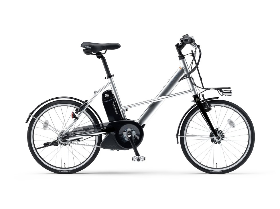 Yamaha City-X electric bicycle with silver aluminium frame, black seat and components, displayed against a white background.
