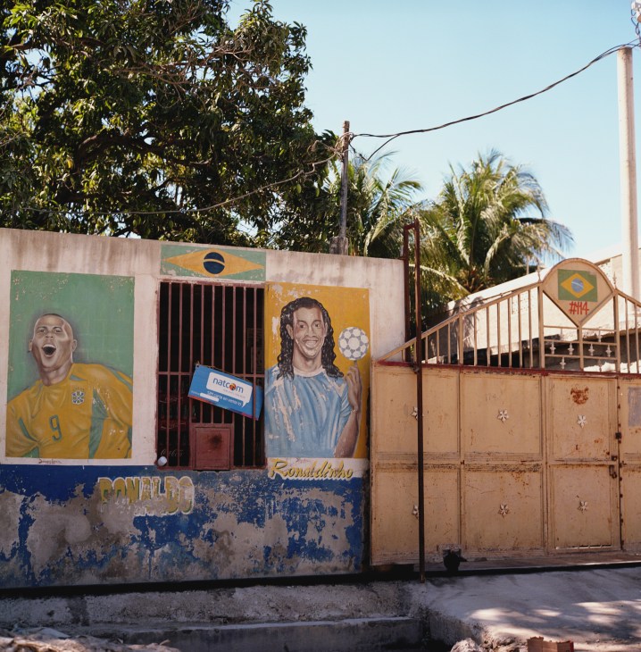 Mural depicting Brazilian footballers Ronaldo and Ronaldinho painted on a building facade in Port-au-Prince, Haiti.