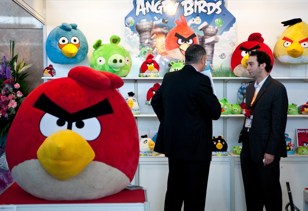 Commonwealth Toy & Novelty booth displaying Angry Birds plush toys at Hong Kong Toys & Games Fair.