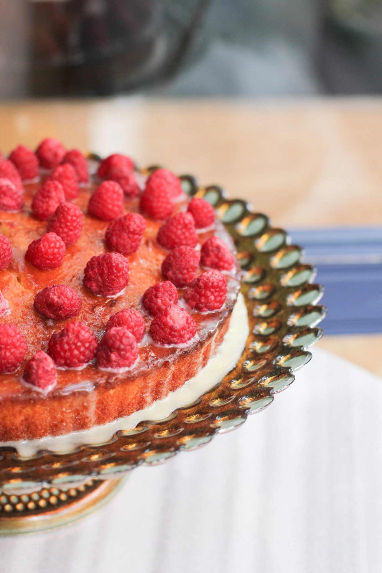 Raspberry tart with cream filling on decorative plate at Four Letter Word, Istanbul