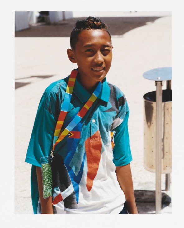 Francisco Maria Xavier de Jesus Araújo da Silva, a 13-year-old table tennis player from Timor Leste, wearing a blue shirt and colorful lanyard.