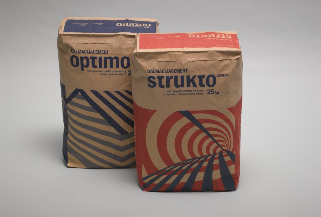 Two Dalmacijacement cement bags with geometric design: Optimo with house-inspired stripes and Strukto with tunnel-inspired concentric circles.